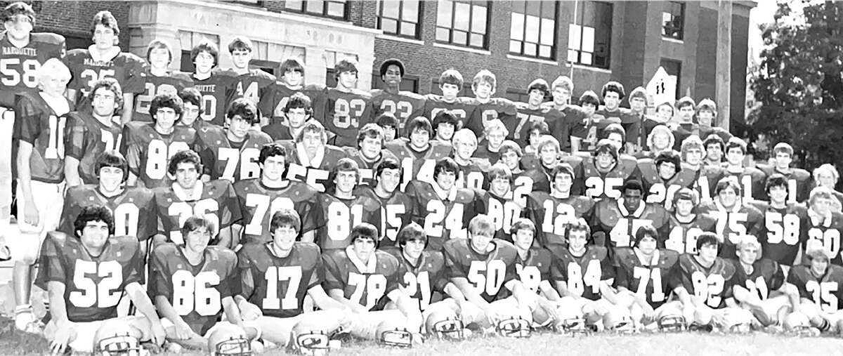 The 1982 Marquette Catholic High Explorers went 12-1 and finished second in the state, advancing to the Class 3A state title game before falling 17-6.