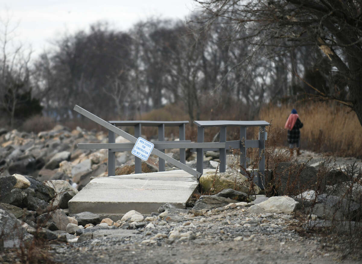 A wood plank is knocked over from the recent storm at Greenwich Point Park in Old Greenwich, Conn. Tuesday, Dec. 27, 2022. The park's bridges and south shore incurred damage from the storm that will require restoration work.