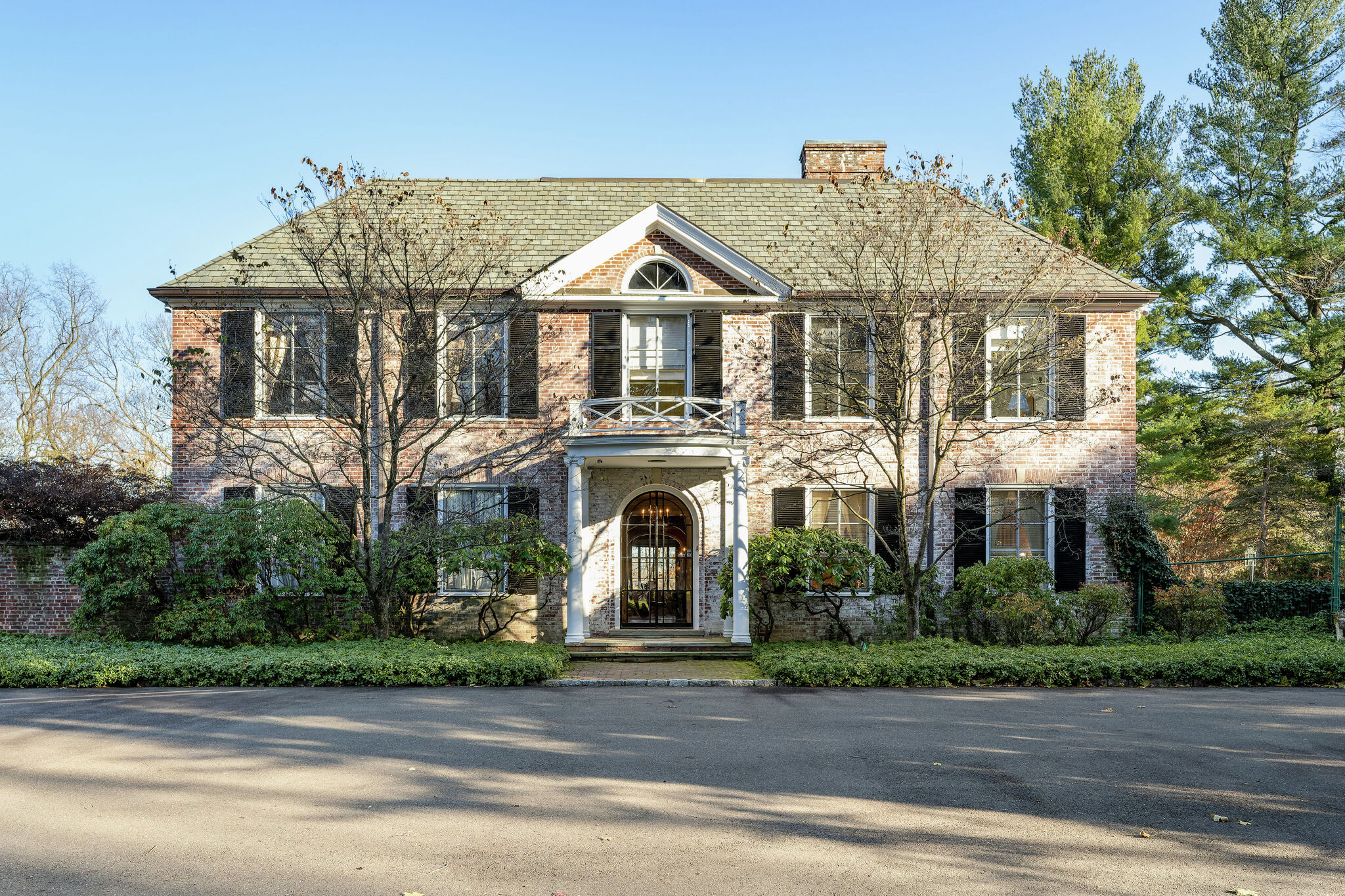 Georgian brick manor in Greenwich on the market for $7.9M.