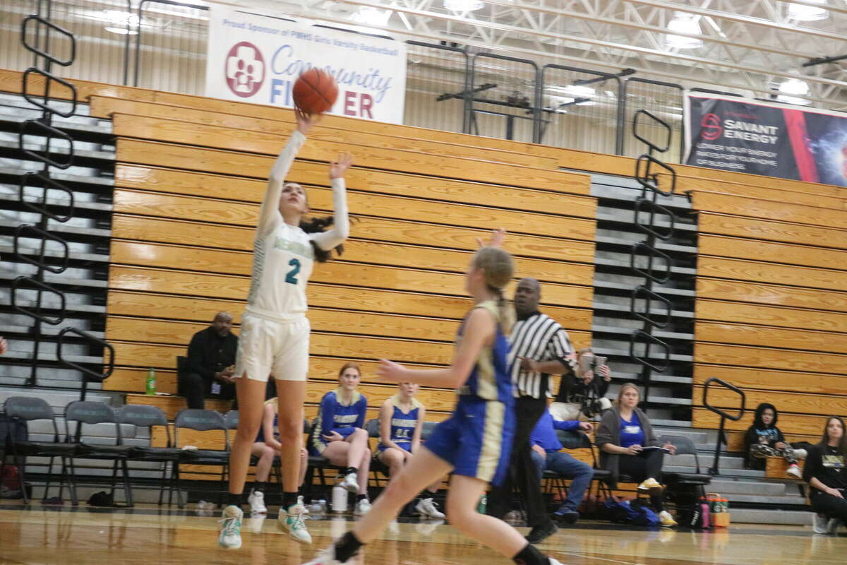 Memorial's Cassandra Perez (2) shows her form in knocking down a jumper from the right side Tuesday afternoon. She scored in double figures, one of four Lady Mavs to do so.
