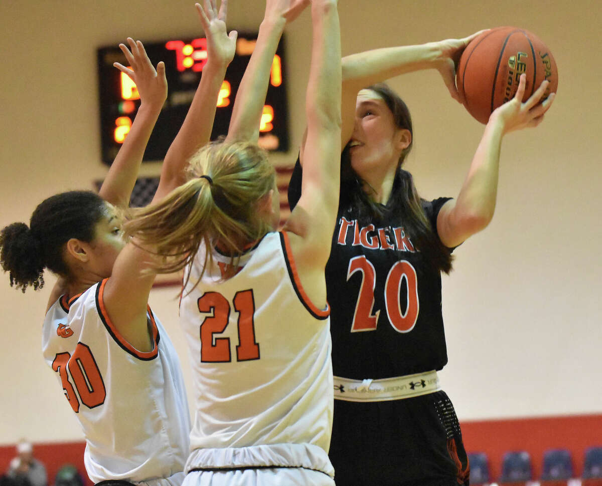 Edwardsville's Emerson Weller puts up a contested shot against Webster Groves in the first half of Tuesday's game at the Visitation Christmas Tournament in St. Louis.