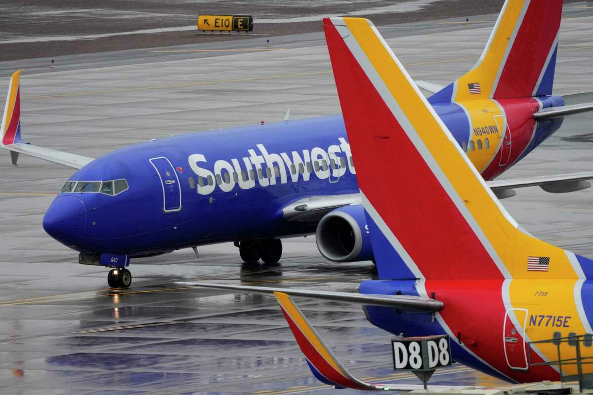 A Southwest Airlines jet arrives at Sky Harbor International Airport, Wednesday, Dec. 28, 2022, in Phoenix. Travelers who counted on Southwest Airlines to get them home suffered another wave of canceled flights Wednesday, and pressure grew on the federal government to help customers get reimbursed for unexpected expenses they incurred because of the airline’s meltdown.