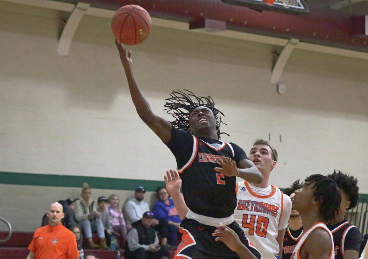 Edwardsville's Malik Allen makes a contested layup against Clayton on Wednesday during the consolation quarterfinal of the Don Maurer Invitational at MICDS. EHS won 61-30. 