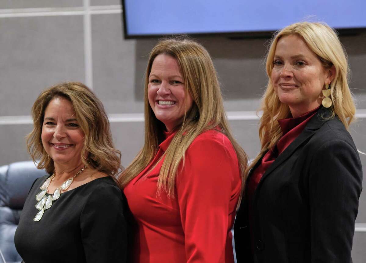 Misty Odenweller (L) Melissa Dungan (C),and Tiffany Nelson (R) are all smiles after being sworn in as Conroe I.S.D Trustees, Friday, November 18, 2022, in Conroe.