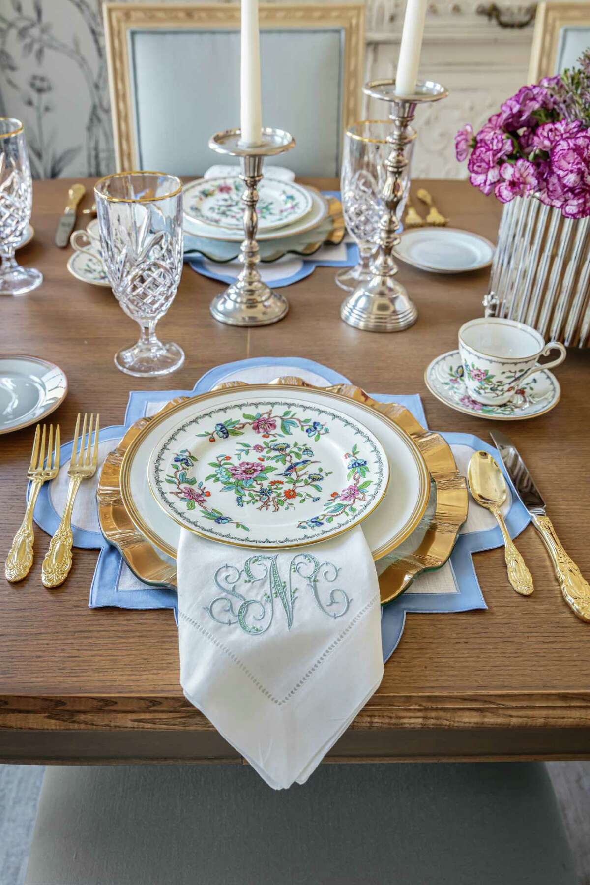 Neal's dining table is set with Aynsley's Pembroke fine china pattern.