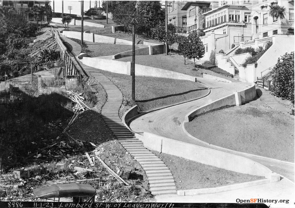 When early automobiles were unable to make the trip up steep Lombard Street, the roadway was redesigned with curves to break up the climb. In 1923, the street was altered to suit car travel.