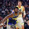 James Wiseman (33) boxes out Walker Kessler (24) on a free throw attempt in the first half as the Golden State Warriors played the Utah Jazz at Chase Center in San Francisco, Calif., on Wednesday, December 28, 2022.