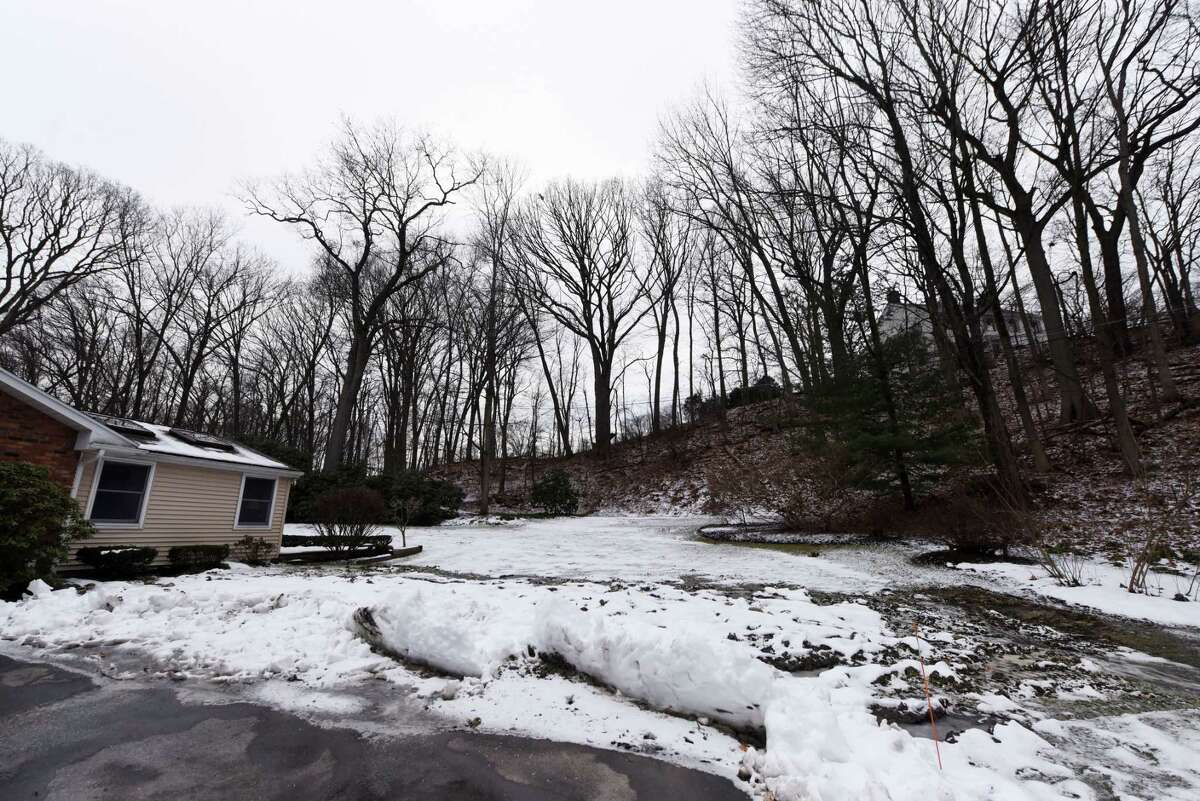The backyard of Worth Gretter’s home where two 400 foot holes were drilled for geothermal heating on Wednesday, Dec. 28, 2022, in Menands, N.Y.