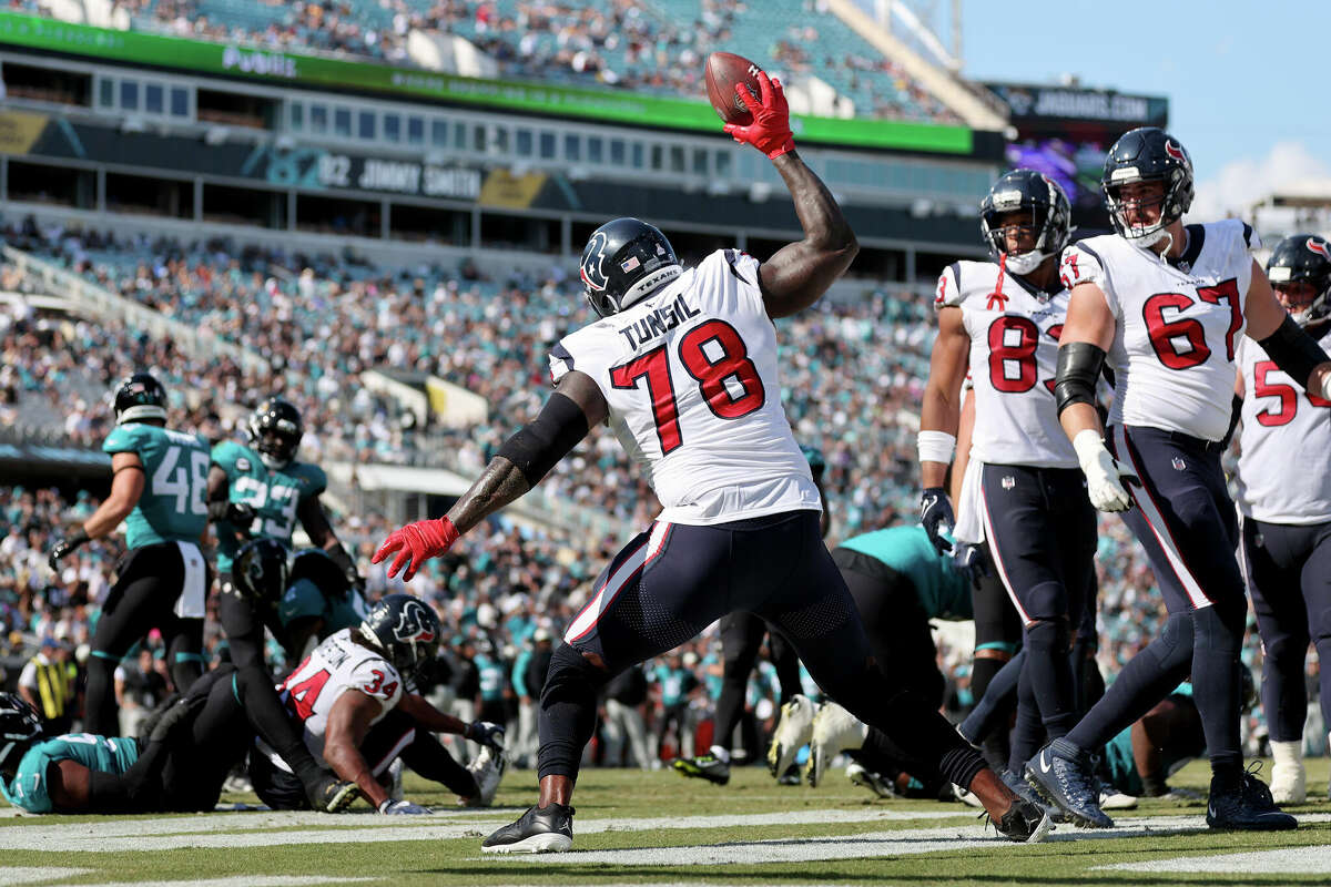 Houston Texans running back Dameon Pierce (31) scores a touchdown against  the Jacksonville Jaguars during the