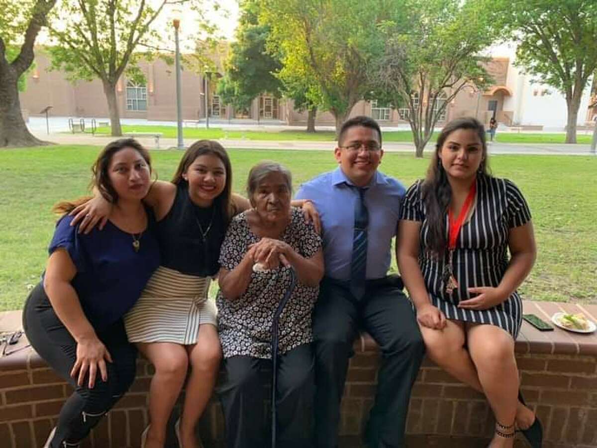 Victoria Puente Madrigal (center) with members of her family. 