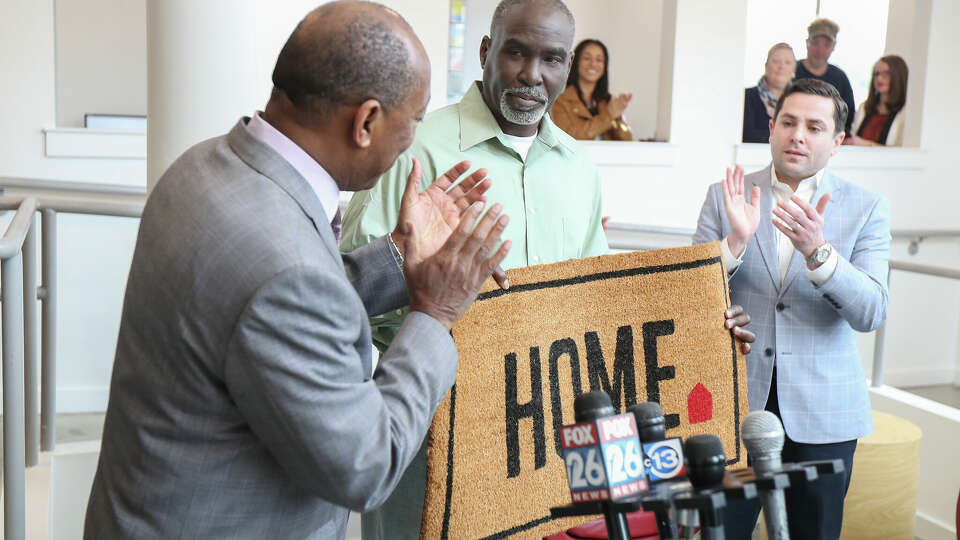 Mayor Sylvester Turner (left) and Special Assistant to the Mayor for Homeless Initiatives Marc Eichenbaum (right) welcomed Joseph to his new home through The Way Home program Friday, Feb. 1, 2019, in Houston. Joseph was homeless and lived in the homeless encampment on Wheeler in Midtown before moving into his new home at New Hope Housing.