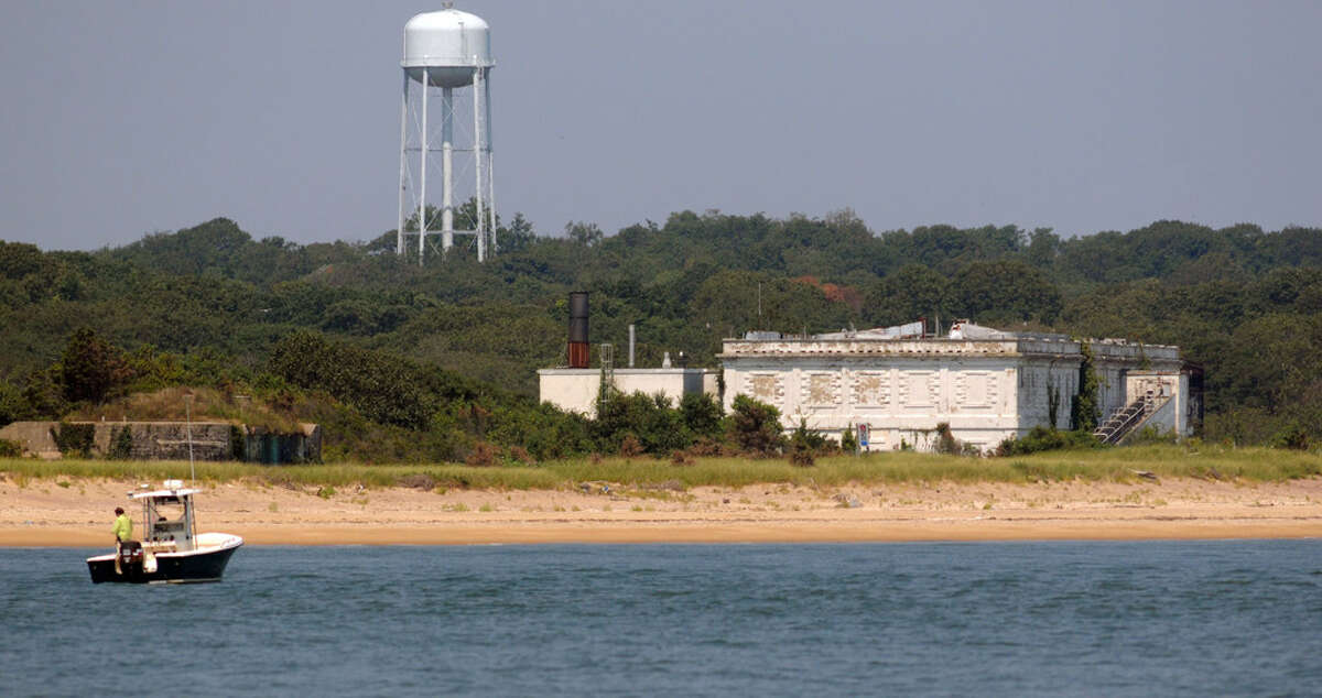 Plum Island, seen in 2013, is the home of the federal government's Animal Disease Center. What to do with the island once the facility closes in the next few years has been the subject of a decade of political debate. 