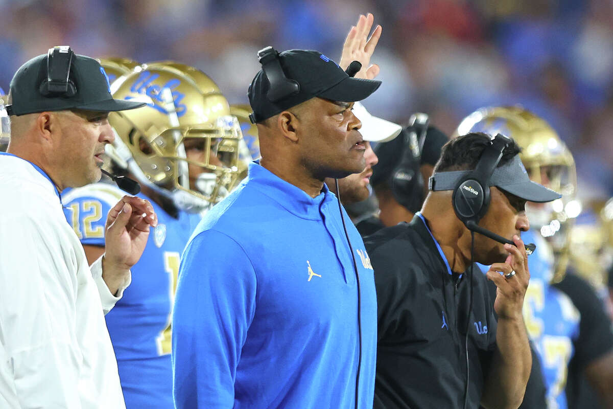 UCLA Bruins linebackers coach Ken Norton Jr. watches the field during a football game between the USC Trojans and the Bruins in November.