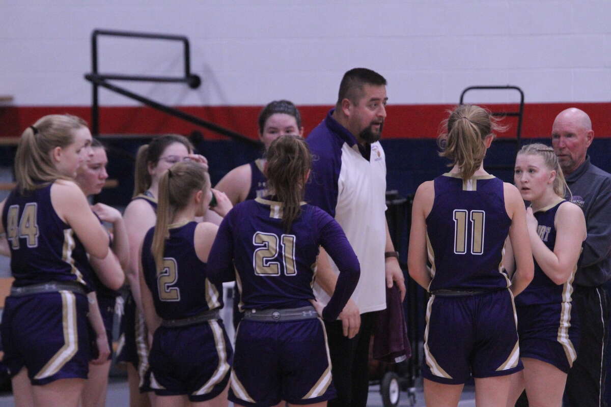 Frankfort head coach Tim Reznich addresses his team during a timeout on Dec. 29.