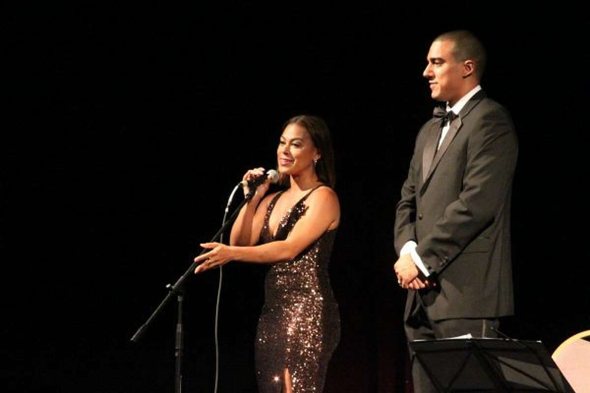 In this file photo, Manistee-raised actress Toni Trucks and Xavier Verna, executive director of the Ramsdell Regional Center for the Arts, speak to attendees of the Run for Roses gala on May 5, 2018 in the Ramsdell Theatre.