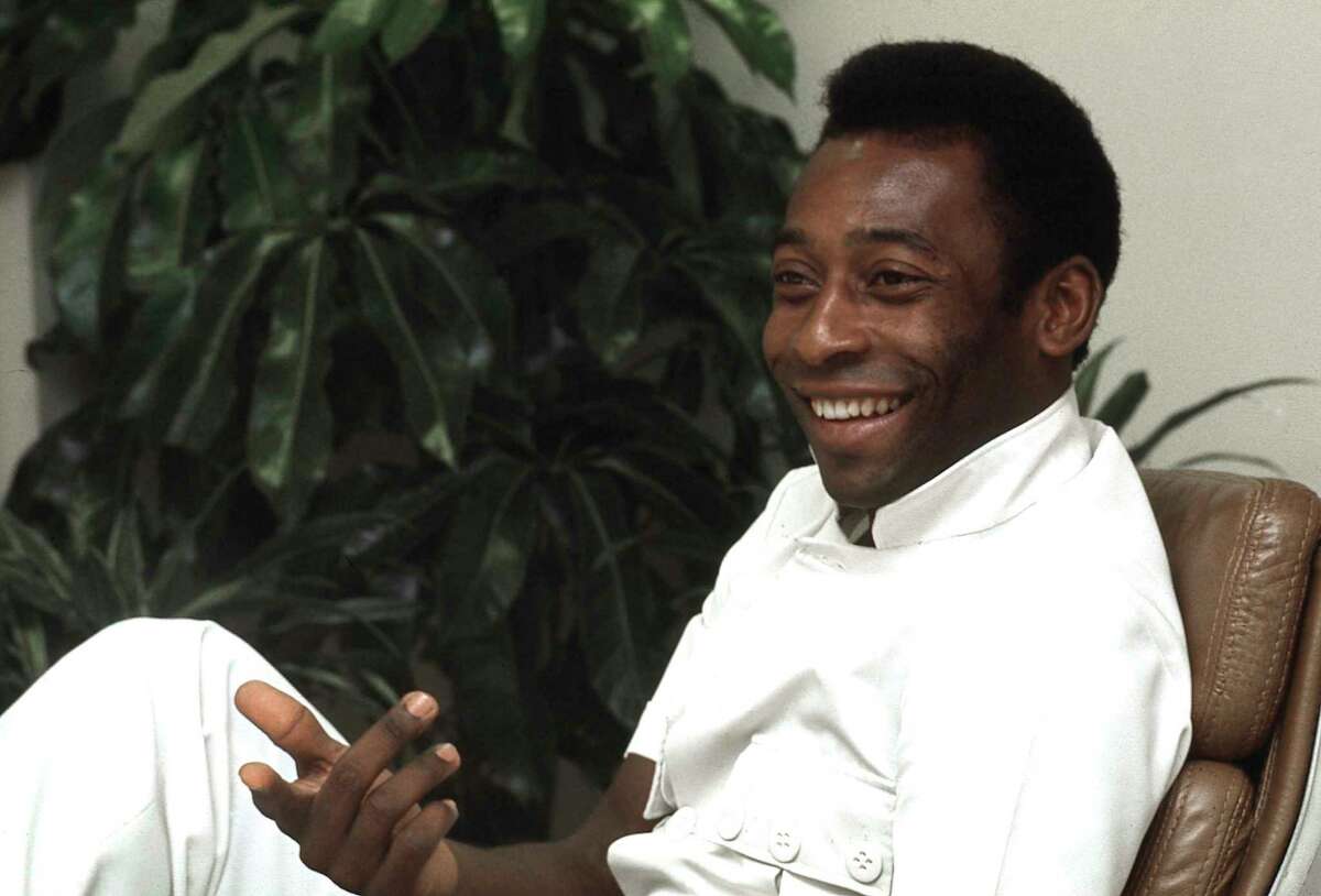 FILE - New York Cosmo's soccer star, Pele, is seen during an interview at in New York on July 1, 1975. Dozens of meetings over four years led to Pelé agreeing to sign with Cosmos in June 1975. His 2 1/2 seasons in New York elevated the sport, putting U.S. soccer on a path to hosting the World Cup in 1994 and launching Major League Soccer two years later.