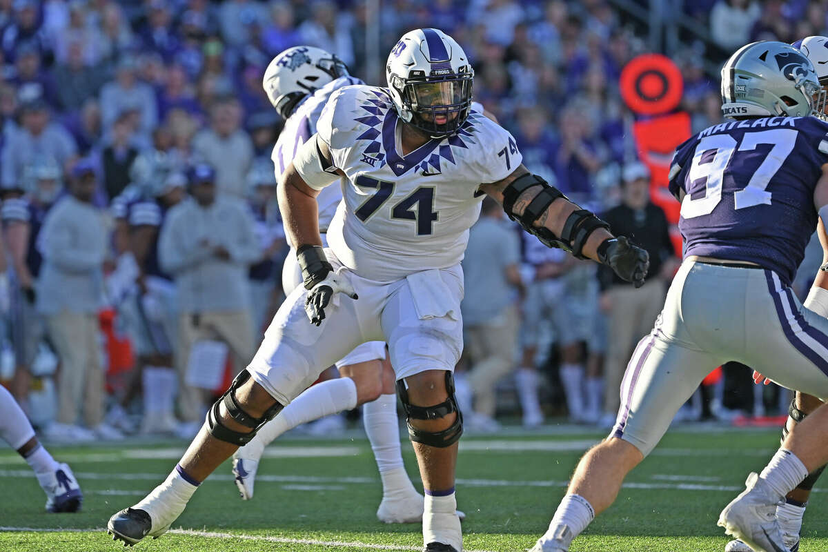 Offensive tackle TCU Horned Frogs' Andrew Coker #74 prepares to block in the second half against the Kansas State Wildcats at the Bill Snyder Family Football Stadium on October 30, 2021, in Manhattan, Kansas.