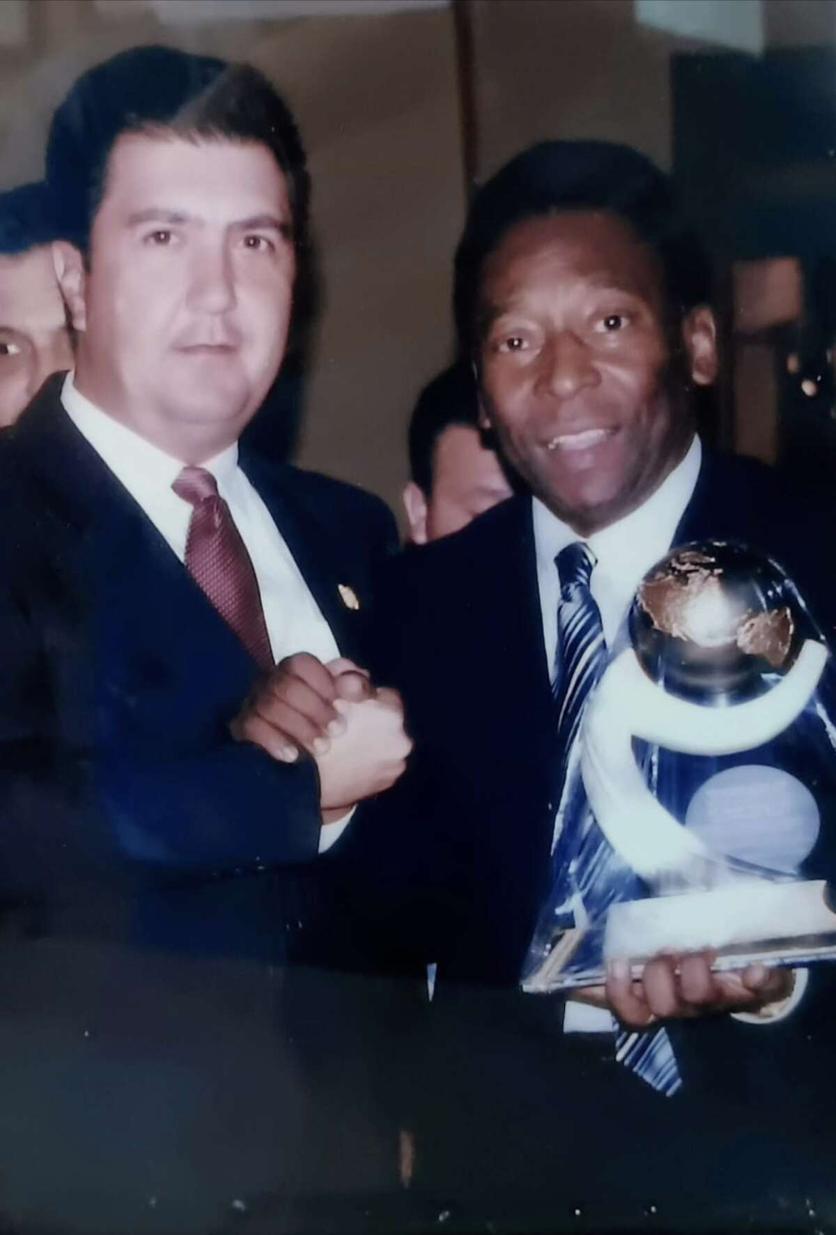 Jorge Alberto Vinals, local businessman from the Dos laredos, with Pele. Pele visited the city of Nuevo Laredo on November 2006 to offer a conference to the youth of the community to speak to them about the importance of education and playing sports instead of getting in trouble or substance absue.