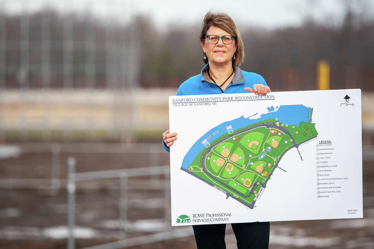 Sanford Village President Dolores Porte poses in front of the site of the new Sanford Community Park on Dec. 30, 2022.