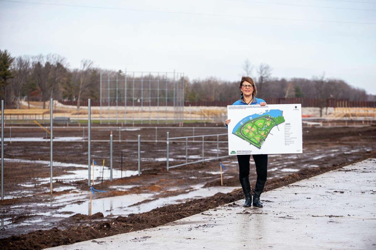 Sanford Village President Dolores Porte poses in front of the site of the new Sanford Community Park on Dec. 30, 2022.