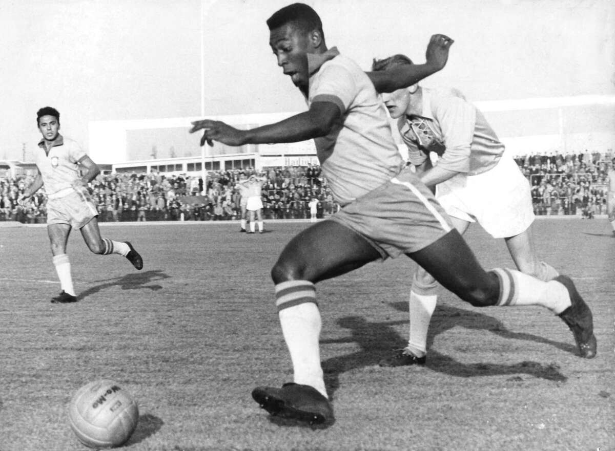 Brazilian soccer star Pele runs with the ball in Malmoe, Sweden, May 8, 1960. Pele became famous when he played with the Brazilian national team at the 1958 FIFA World Cup in Sweden and won the first World Champion title for Brazil. (DPA/Abaca Press/TNS)