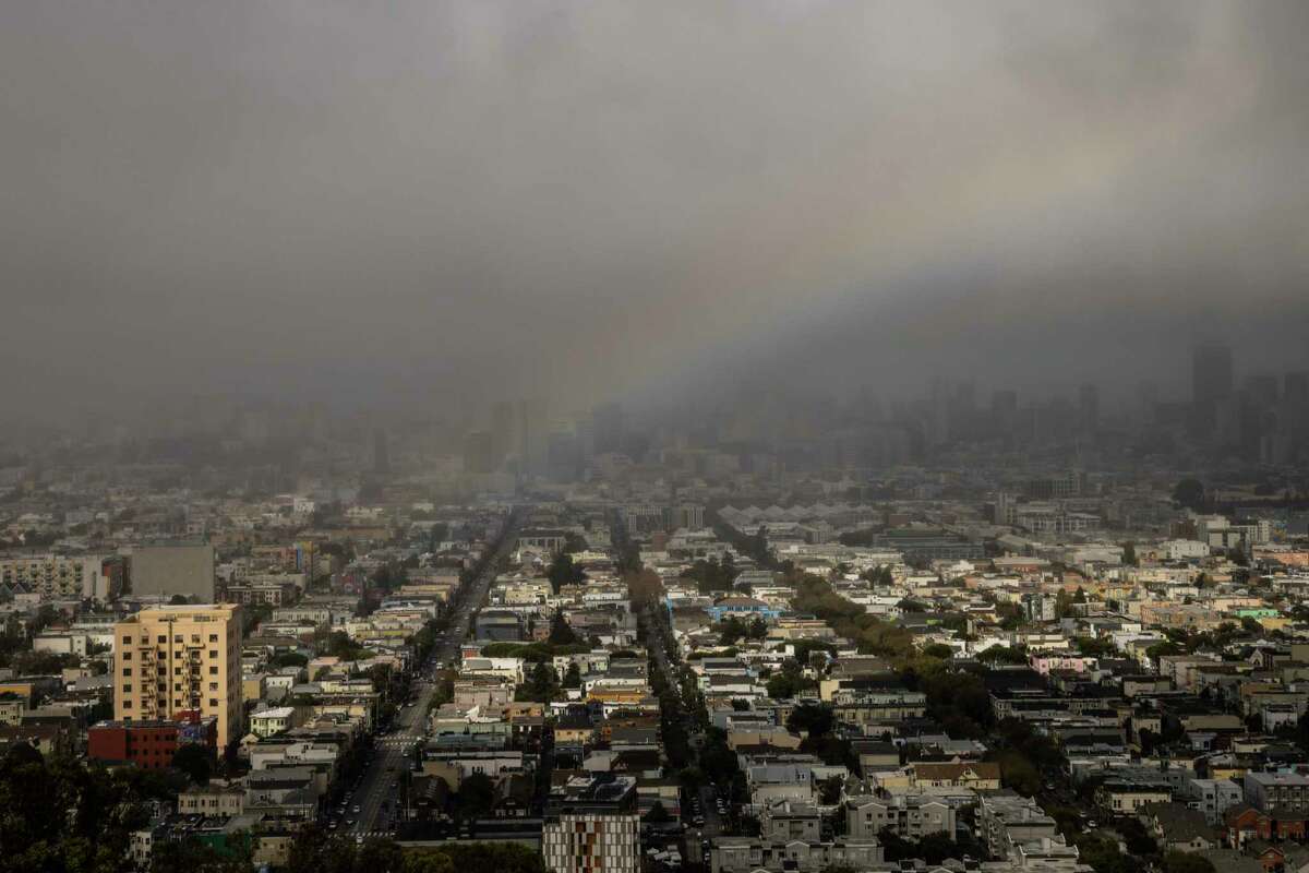 A rainbow appears above the Mission District on a rainy November day.