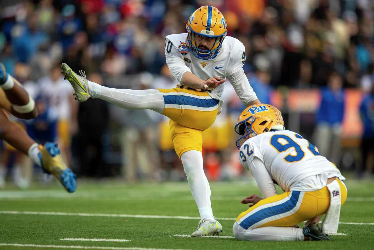 Pittsburgh placekicker Ben Sauls (90) boots the winning field goal during the second half of the Sun Bowl NCAA college football game against UCLA, Friday, Dec. 30, 2022 in El Paso, Texas. (AP Photo/Andres Leighton)