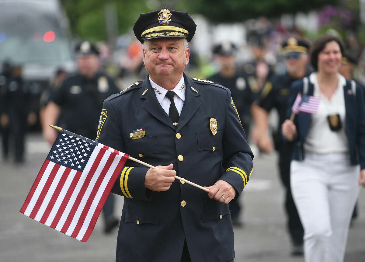 Norwalk Police Chief Thomas Kulhawik marches in the city's annual Memorial Day Parade on East Avenue in Norwalk, Conn. on Monday, May 31, 2021.
