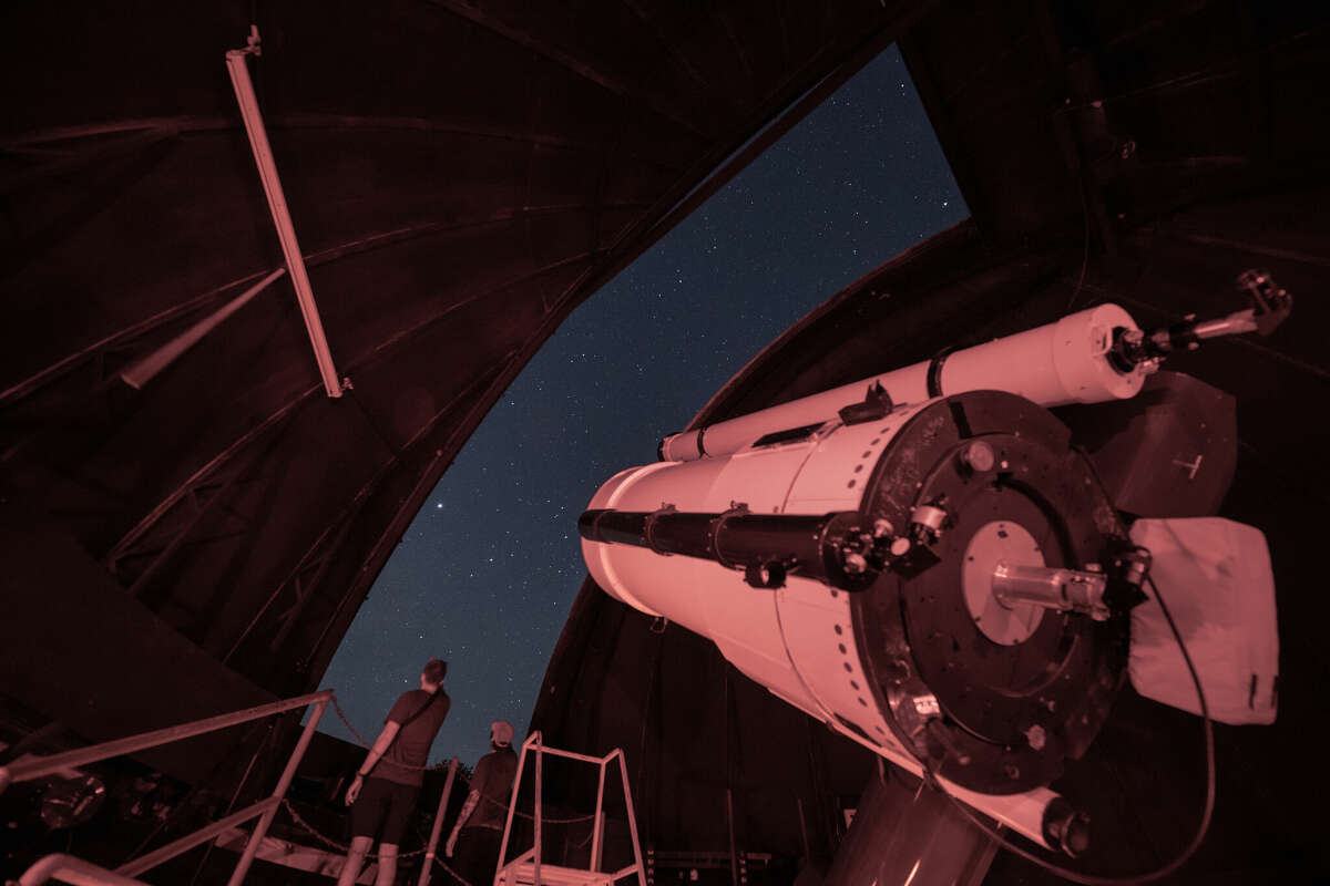 Telescope at George Observatory points toward the night sky.