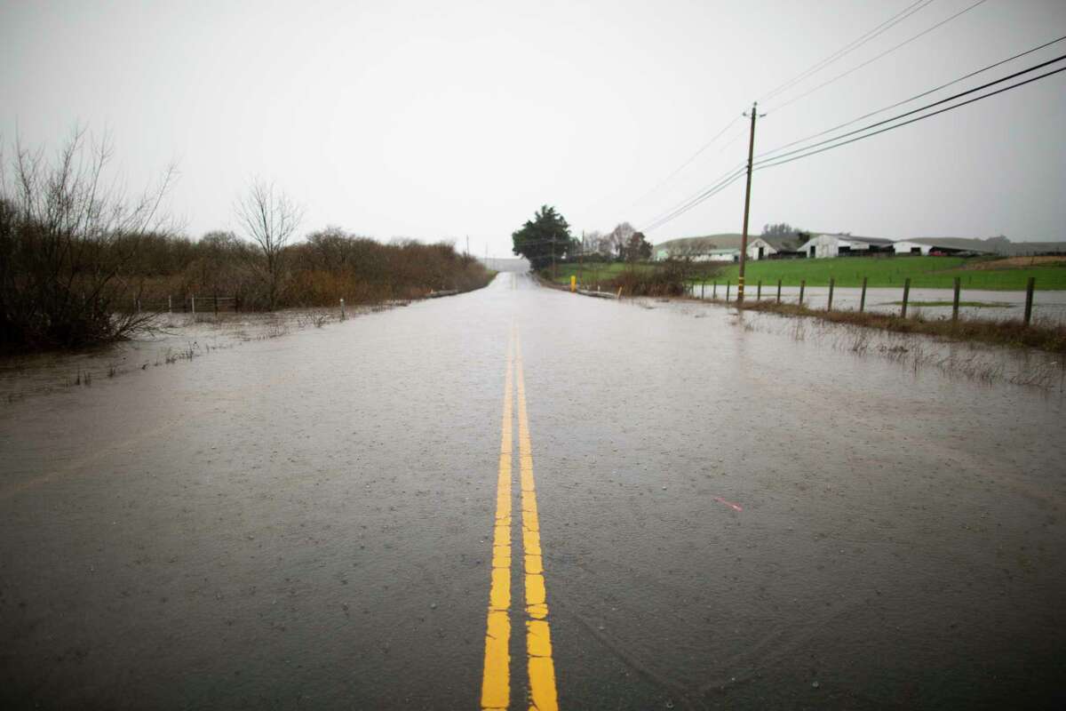 Flooding connected  Vally Ford Rd. Petaluma, Calif, December 31st, 2022. As an atmospheric stream  hits Sonoma County, flood warnings are successful  effect.