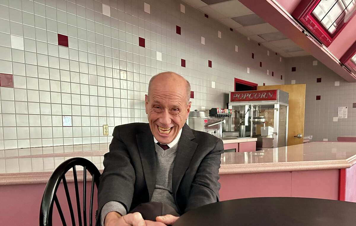 Bill Dougherty in the former Westbrook Outlet Movie Theater, which will be reopened soon as Westbrook Cinemas.