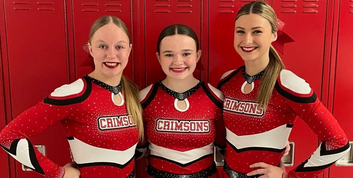 Jacksonville Middle School eighth-grade cheerleaders (from left) Elizabeth Saxer, Kolby Hoffman and Sophia Withee will perform at the Citrus Bowl on Monday.