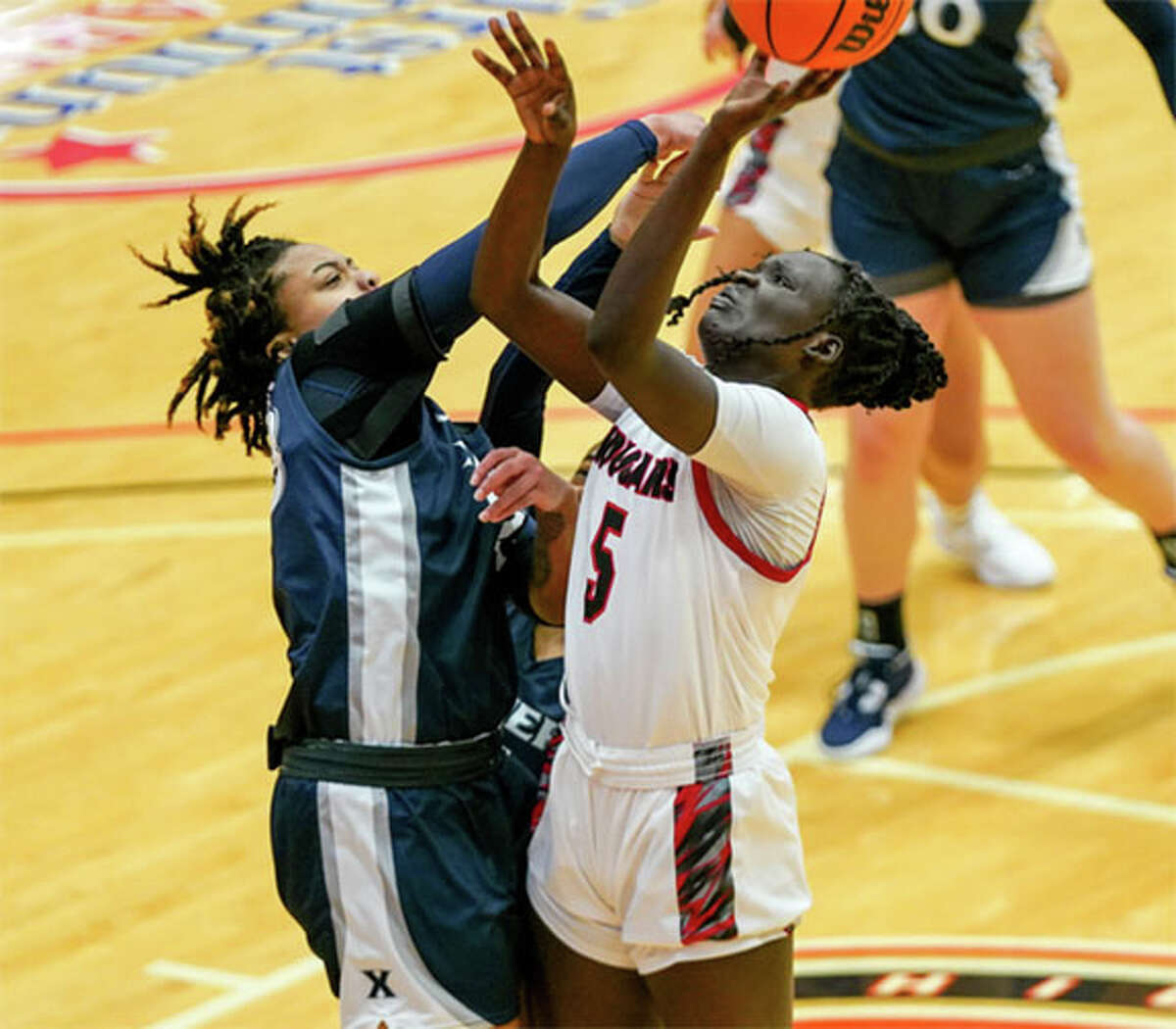 SIUE's Ajulu Thatha (5) posted a double-double in the Cougars' OVC win over Southeast Missouri on Saturday at Cape Girardeau, Missouri. 