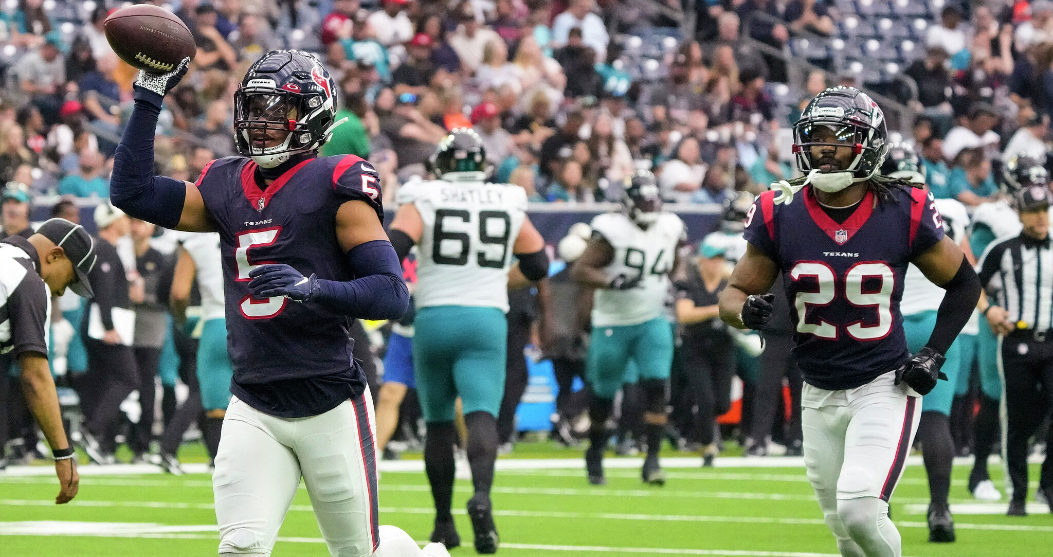 Houston Texans defensive end Troy Hairston (34) warms up against