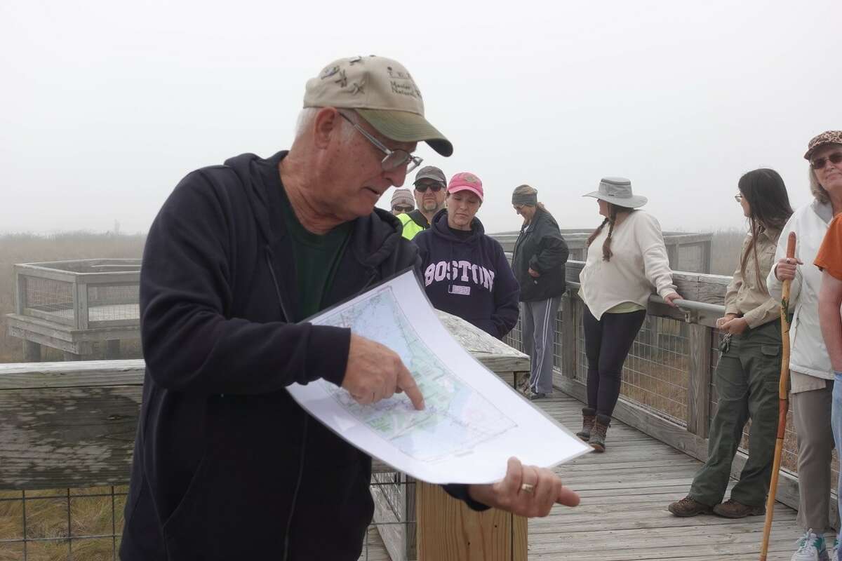 Sabine-Neches Chapter of the Texas Master Naturalists' Gerald Langham gives a brief history of Sea Rim's role in the Civil War prior to the First Day Hike. Photo taken Jan. 1, 2023/ Photo by Olivia Malick/The Enterprise