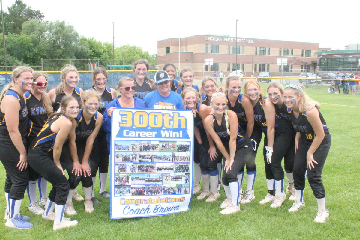 Evart's softball team celebrated a coaching milestone for coach Amanda Brown in 2022 after their quarterfinal win.