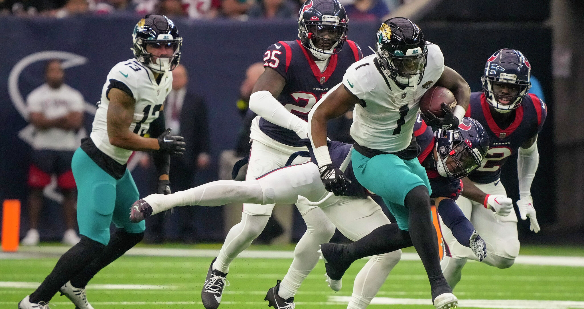 Jacksonville Jaguars linebacker Chad Muma (48) stretches during