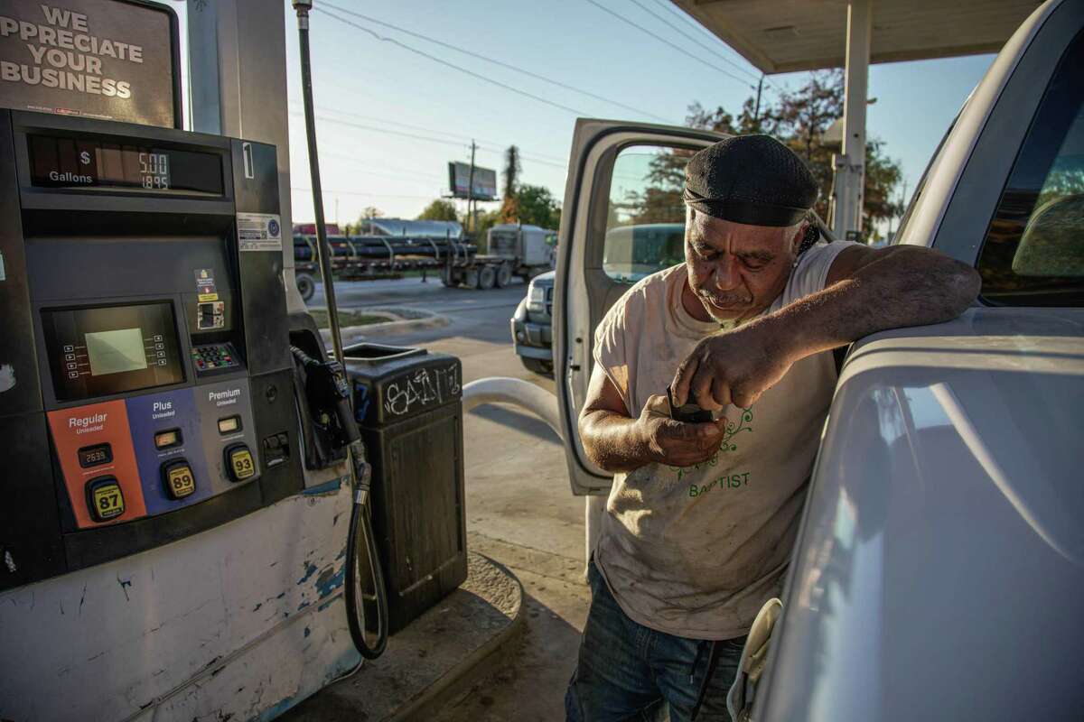 A driver pumping gas in late November in Houston said he isn’t sure what’s driving price changes.