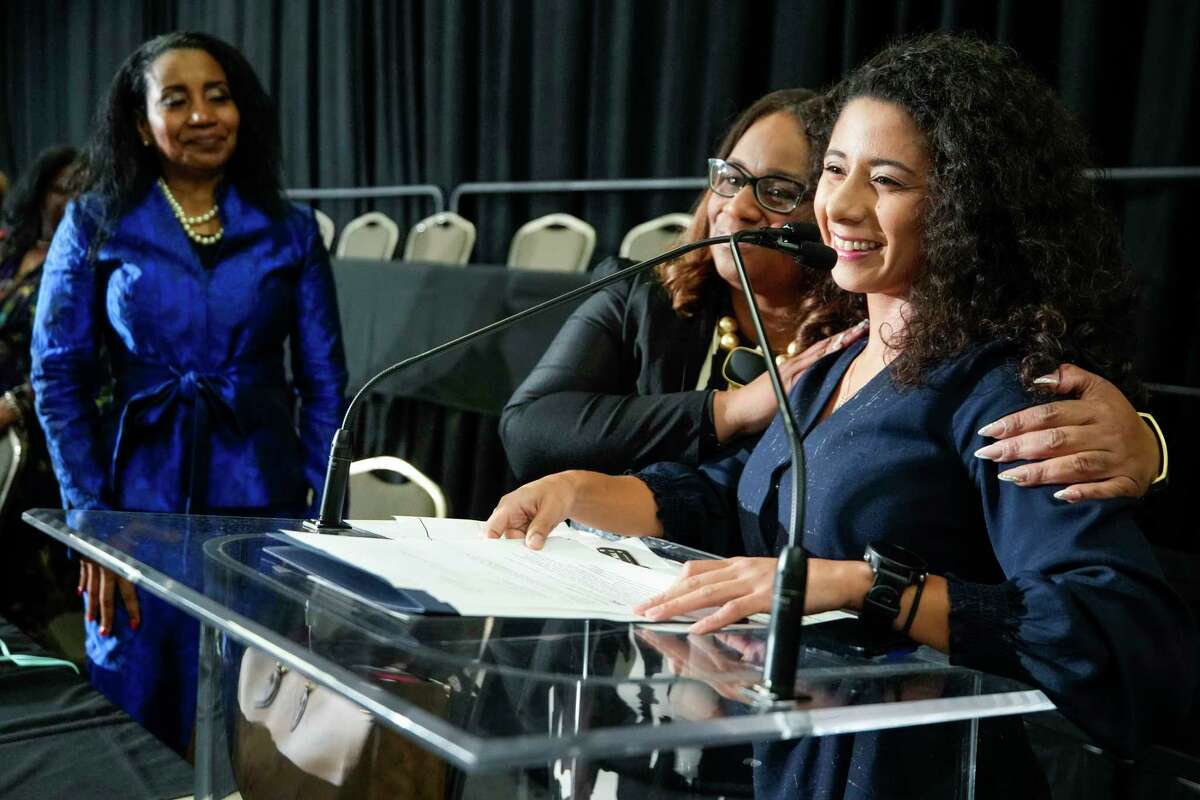 Judge Tamika Craft embraces County Judge Lina Hidalgo as she gives speech during the Harris County 2023 Investiture Ceremony at NRG Center on Monday, Jan. 2, 2023 in Houston. Newly elected and re-elected county officials took their oaths of office during the ceremony.