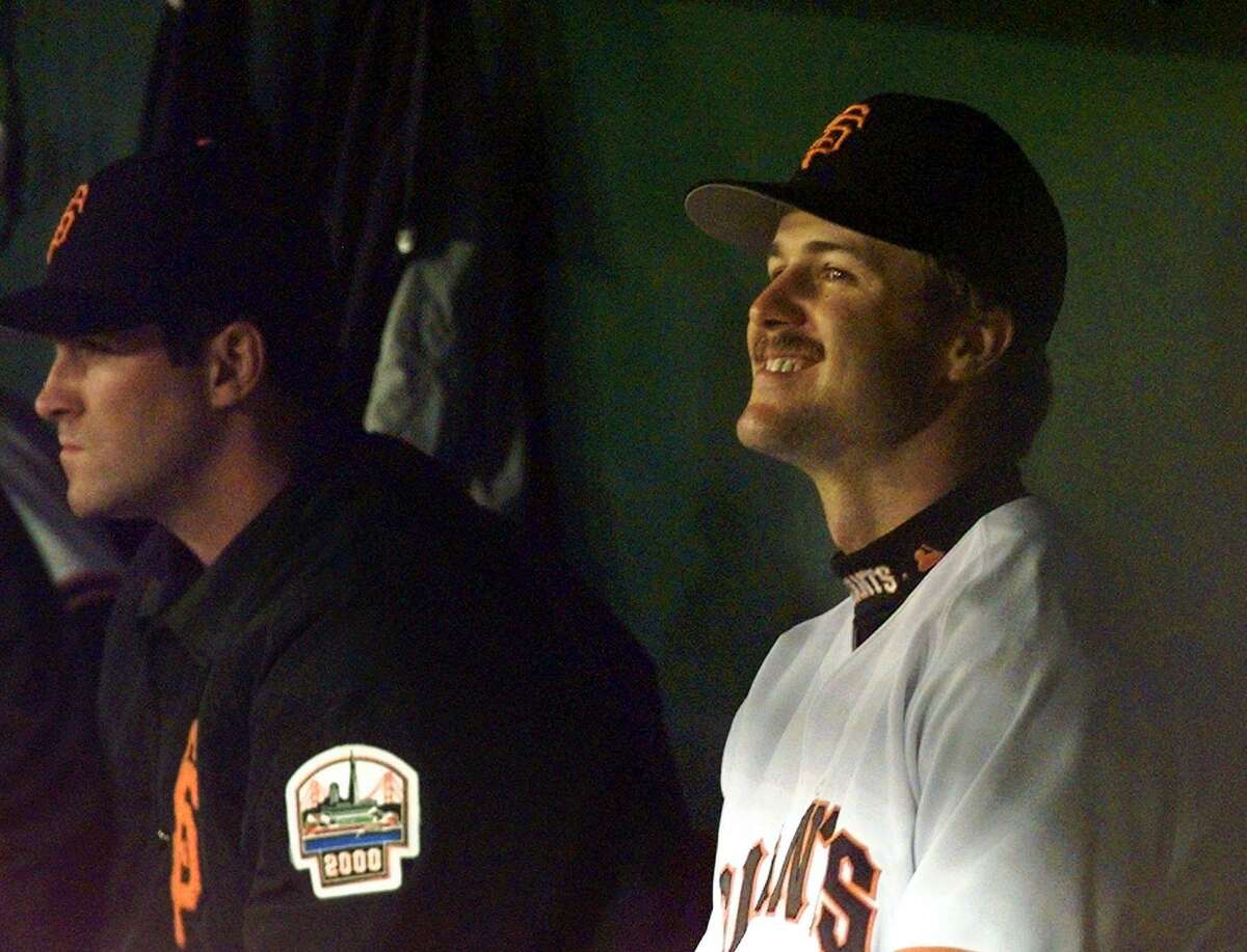 San Francisco Giants Jeff Kent, right, smiles as manager Dusty Baker jokes with him in the dugout in the sixth inning Tuesday, May 20, 1997 in San Francisco. Kent's grand slam in the first inning helped beat the Colorado Rockies 6-3. (AP Photo/Susan Ragan)
