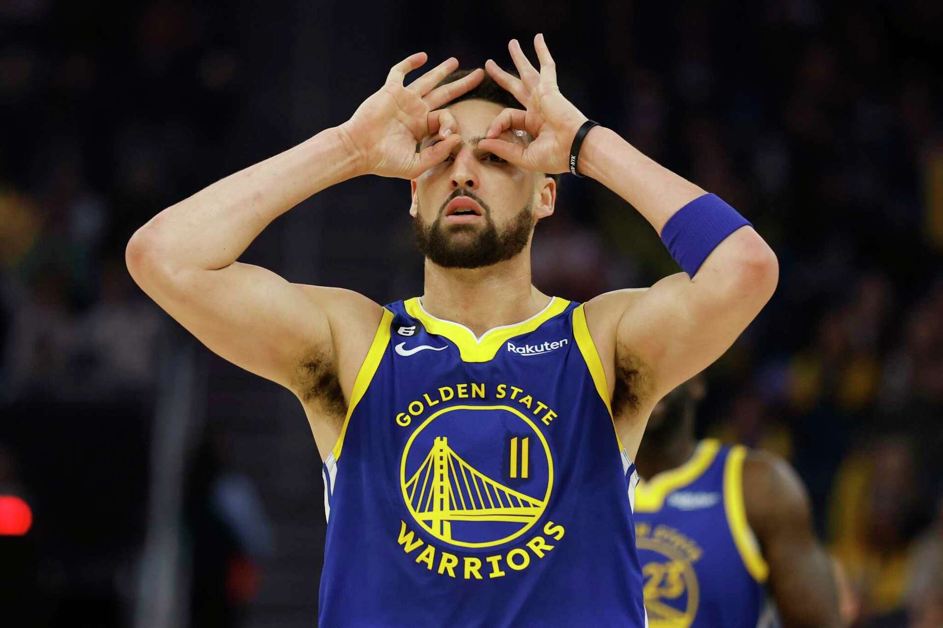 Thompson's 54, Looney's late tip-in give Warriors 2-OT defeat of Hawks