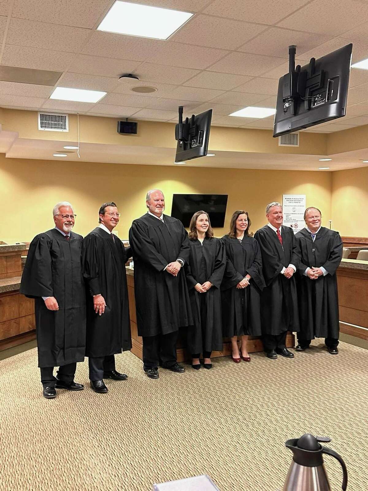 Here is a picture of the active judges in Midland – Mark Dettman, county court-at-law; David Rogers, 142nd District Court; Judge Marvin Moore, County court at-law No. 2; Leah Robertson, 385th District Court; Judge Elizabeth Byer Leonard, 238th District Court; David Lindemood, 318th District Court; Jeff Robnett, 441st District Court. 