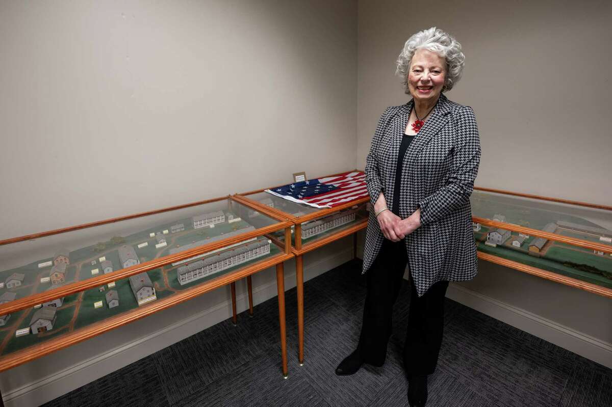 East Greenbush Town Historian Bobbie Reno stands next to a recreation of the Greenbush Cantonment, where the U.S. Army trained and stored supplies during the War of 1812, on Tuesday, Jan. 3, 2023, in East Greenbush Town Hall in East Greenbush, NY.
