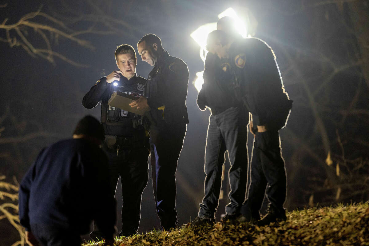 Police prepare to depart after investigating a crime scene related to the suspected murder of a 2-year-old boy on January 02, 2023 in Stamford, Connecticut. Police are holding Edgar Ismalej-Gomez, a 26-year-old felon who previously served time for abusing his son, is under suspicion of killing the boy and burying his remains in a local park while holding the child's mother at gunpoint for days, officials said. Ismalej-Gomez is being held under a $3 million bond. 