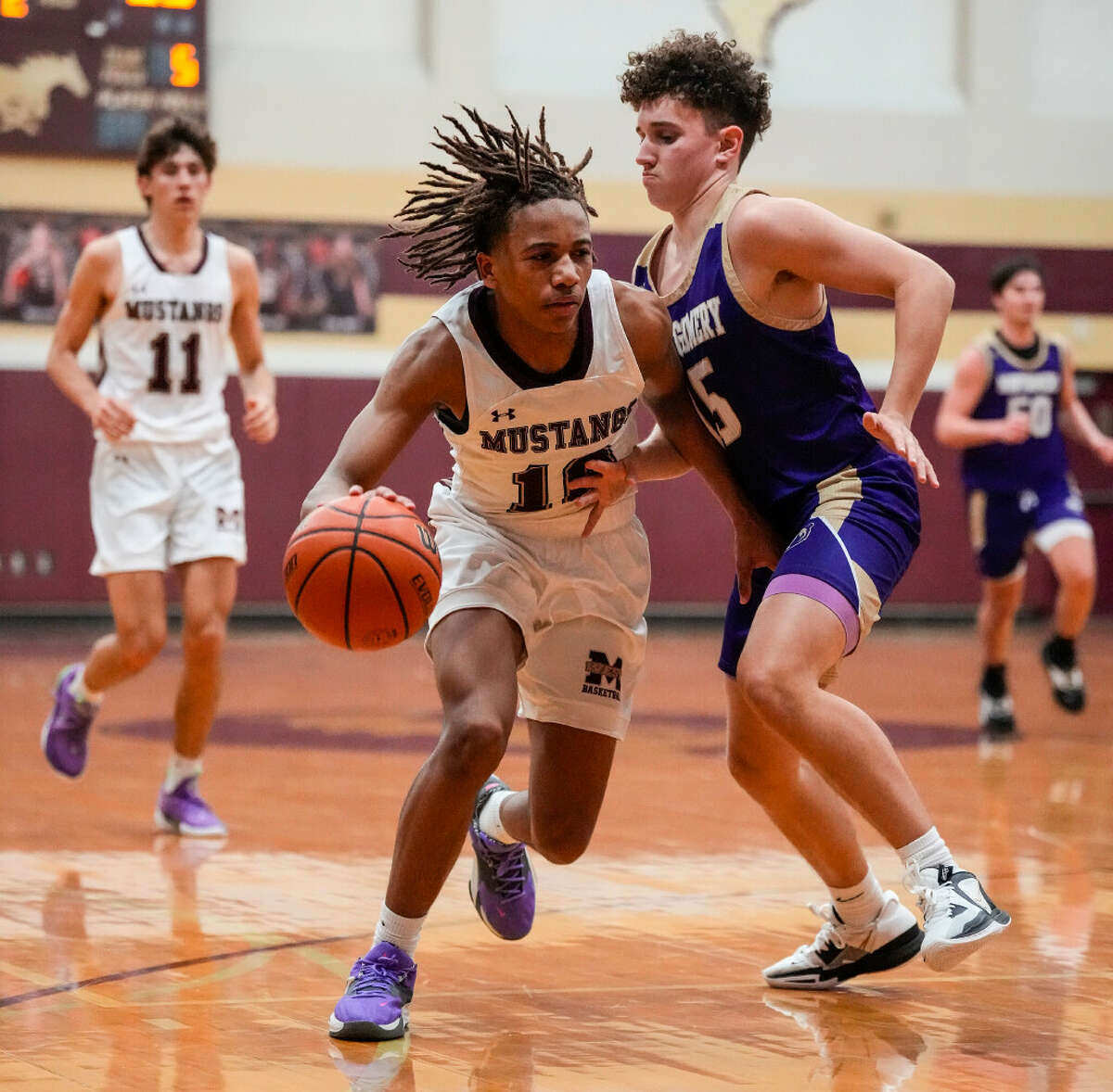 Magnolia West shooting guard Xavier Portalis (10), shown here in the earlier matchup with Montgomery, scored 22 points Friday night.