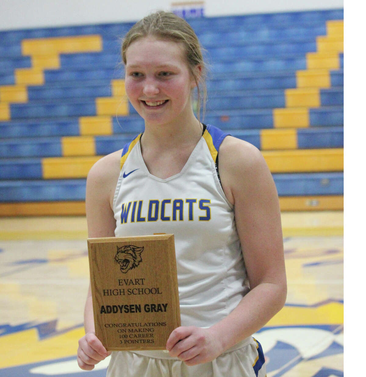 Evart on Monday night presented Addy Gray with a plaque for reaching 100 3 pointers in her career.