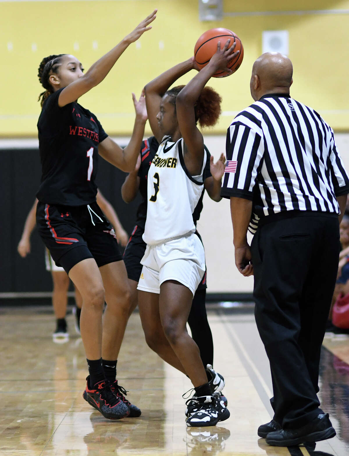 Westfield senior guard Kierra Merchant (1) plays tight defense against Eisenhower senior guard Keyara Ford (3) during the first quarter of their matchup at Eisenhower High School on Tuesday night, January 3, 2023.