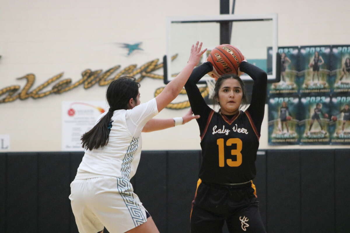 Deer Park's Faith Ramirez looks for an open teammate during first-half action Tuesday night. Ramirez finished with nine points, but co-led the team in buckets with four.