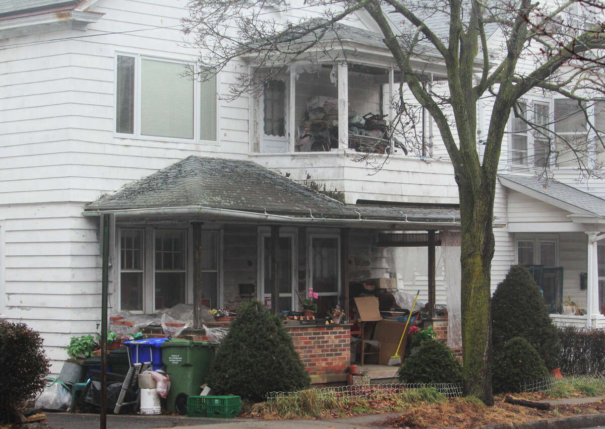 This home at 144 Grand St. in Middletown, is on notice for blighted conditions, including materials in the yard, porches and driveway, according to the city.