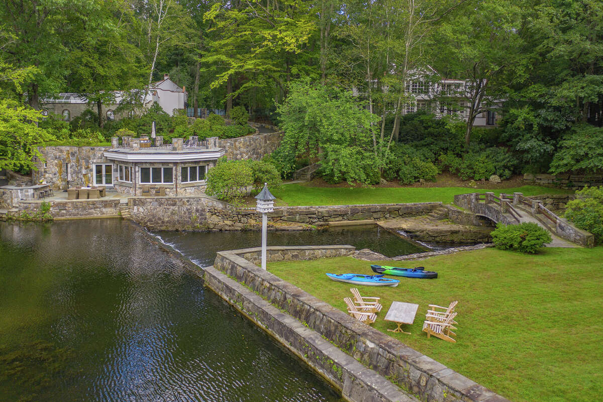 The compound at 157 Easton Road in Westport, nicknamed "The River Run" is set along the Aspetuck River and includes a main house, guest house and river house.